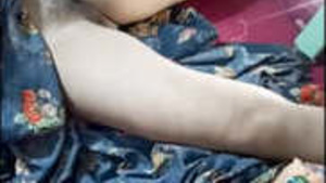 A man satisfying his wife's genitals