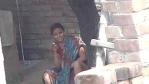Young Indian village girl exposing herself to the next door man