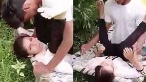 Outdoor sex in an unseen location.