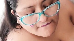 A beautiful wife with large breasts gives a deep blow job to her lover.