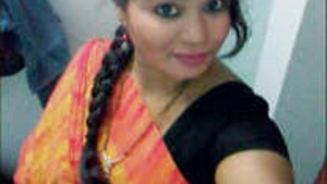 Married Indian woman enjoying passionate doggy style sex with young stud.