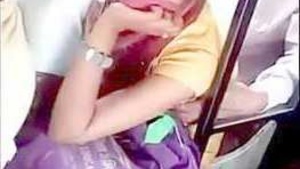 An Indian girl gets her breasts squished on the crowded bus and she likes it a lot.