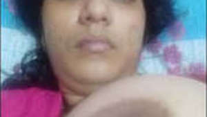 A sexy woman from the East exposes her beautiful big boobs.