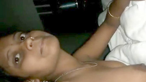 Pretty girlfriend and lover in Indian setting in bedroom