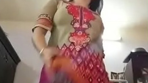 A spicy Indian girl exposing her breasts and genitals.