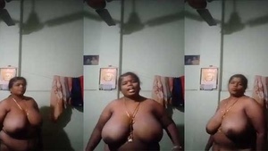 Big-boobed South Indian wife poses topless for a selfie with her husband