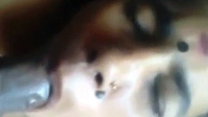 A mature Tamilmaid in an MMS video engages in oral sex by sucking a cock and swallowing cum.
