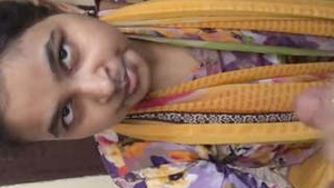 A beautiful Tamil woman gives a blowjob to her lesbian partner.