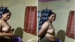 Pretty big-breasted Tamil wife in clothes after sex