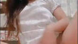 Hot girl masturbates and squeezes her breasts in a new video.