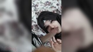 Beauty in hijab gives great blow job and enjoys pussy fingering