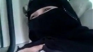 Beautiful woman in a hijab in a porn film.