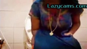 Tamil beauty gets hot in bathroom solo XXX video