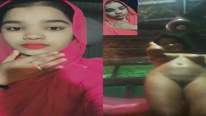 A naked teenage girl on a video call with her boyfriend.