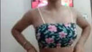 Pretty Indian shopgirl exposes her tits and vagina to her lover via video call.