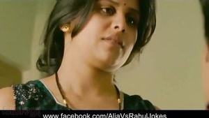 A seductive photo of an aunt who was tempted by a kitchen kiss from a young man