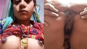 Delivers homemade porn with a Dehati Desi Bhabhi showing her ass and boobs on a live webcam.