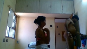 A selfish boss orders a shameless couple to have sex in a hotel room.