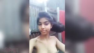 Small perky bosom of a petite girl in homemade nude MMS from a village