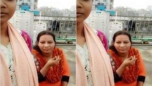 This is a video of a hot Indian auntie who undresses during a video call.