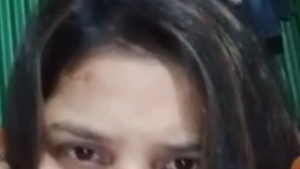 Hot combo of brain and beauty, a village girl answering a video call.