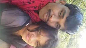 Pretty Indian woman suckling her man’s breast.