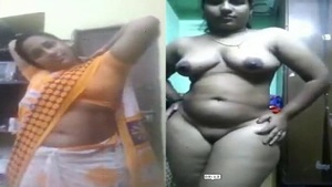 Tamil aunty's big boobs are exposed in this video.