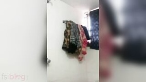 Hot Bangladeshi woman undresses and washes up in a bathtub in XXX content.