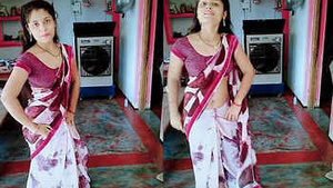 Pretty blonde beauty Preensi's sensual navel dance performance.