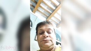 Married man watches his curvaceous wife use a sex toy alone.