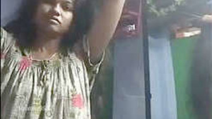 Here is a hot video of a village housewife undressing.