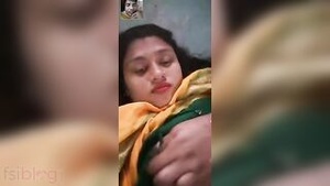 Amusing Bangladeshi woman exposes her large breasts to her partner.