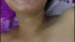 Beautiful Indian housewife undresses herself.