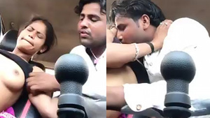 Hot desi couple sucks each other’s breasts while in the car
