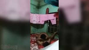 A Bengali husband makes love to his wife and is videotaped during the process.