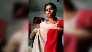 Sexy Dehati beauty performs a hot strip tease in front of the camera.