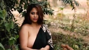 Hot wife with big natural boobs makes a sex video in the woods.
