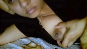 Pretty girl showing her beautiful boobs and-wet pussy to her lover.