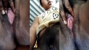 A virgin village girl showing her hairy pussy on camera while she masturbates.