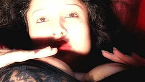 Beautiful desi babe, Mehuly, enjoying her large breasts.