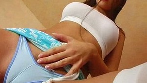 Evy’s solo play with a cucumber-shaped dildo