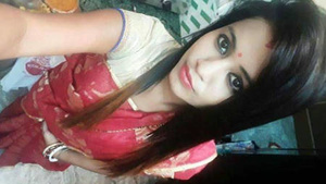 A young Tamil woman gives her partner oral sex.