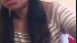 A beautiful woman flaunts her large breasts and vagina during a video call.