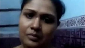 Big breasted woman bathing alone in a tub for some fetishists.