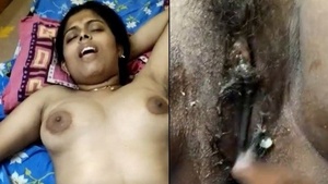 An Indian housewife sucks her lover's cock and finger herself.