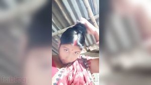 Beautiful Bengali wife with big breast shows off her assets.