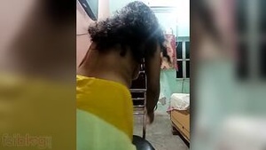 A striptease with a bhabhi in a home video with a red dot on her forehead.