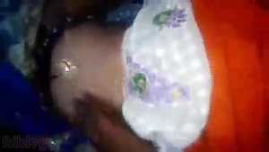 Married Indian woman having sexual relations with her husband at night.