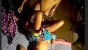 A couple from the village of Aldeia having sex at night.