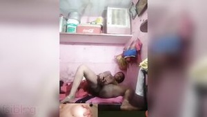 Desi bhabhi masturbates with a big dildo on a video call.